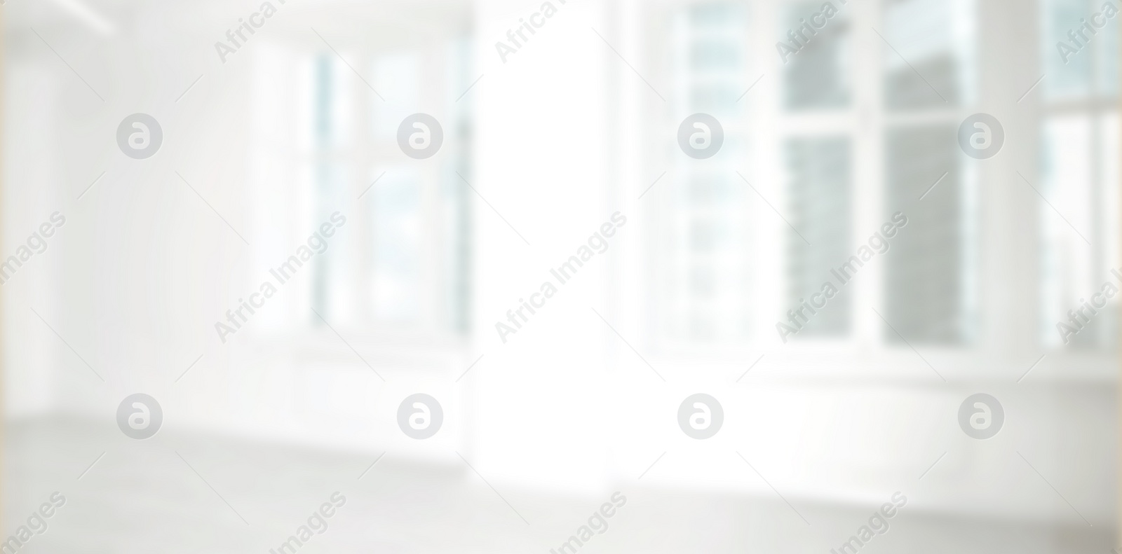 Image of Empty room with white wall and windows, blurred view. Banner design