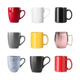 Image of Set with different beautiful cups on white background