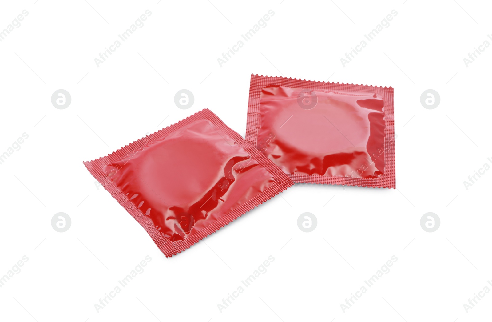 Photo of Condom packages isolated on white. Safe sex