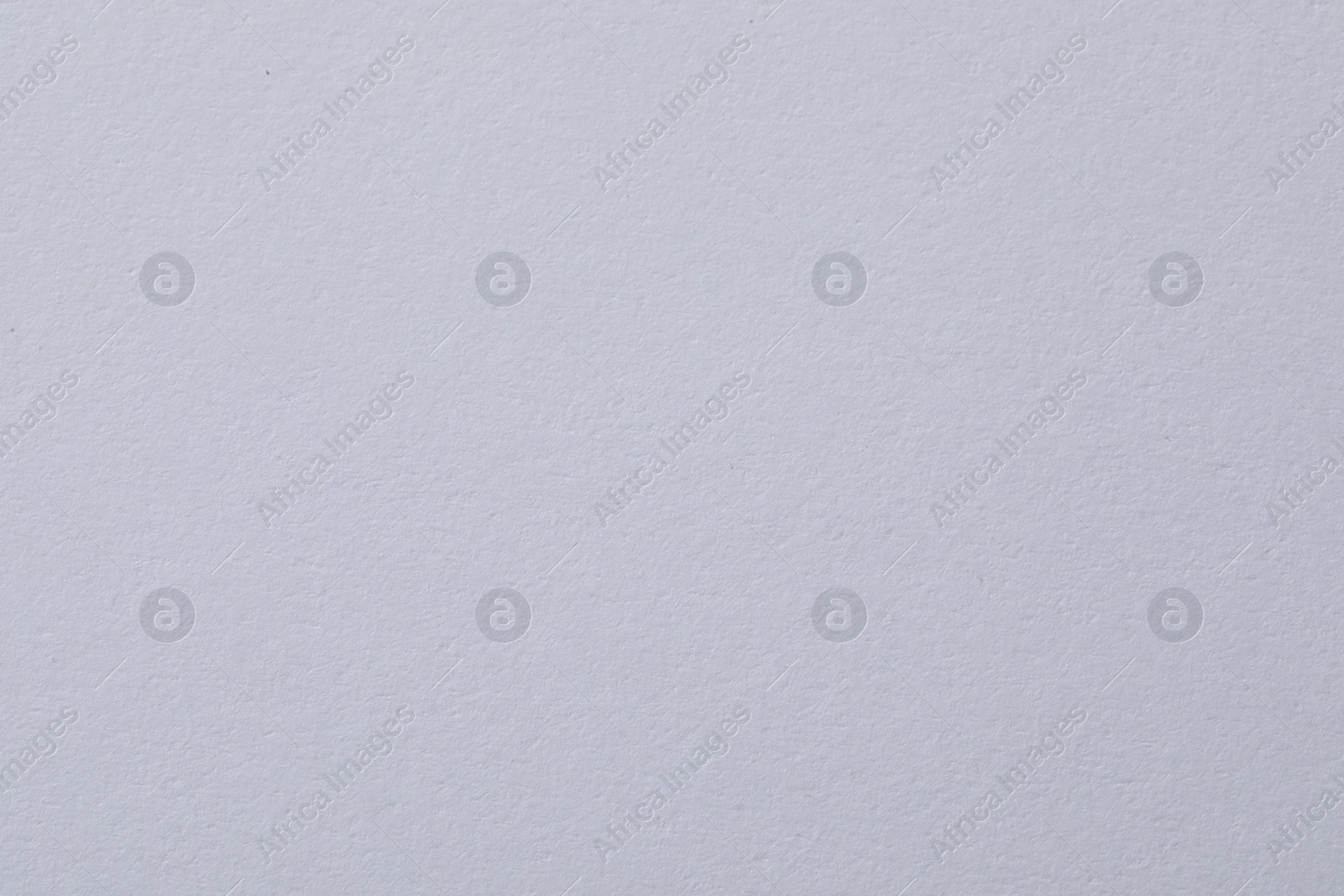 Photo of Texture of white paper sheet as background, closeup