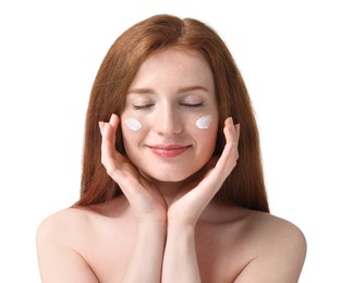 Photo of Beautiful woman with freckles and cream on her face against white background