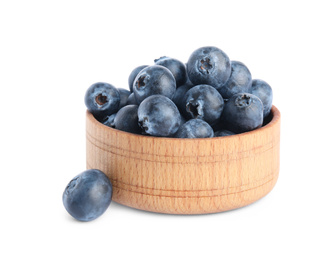 Fresh ripe blueberries in bowl on white background