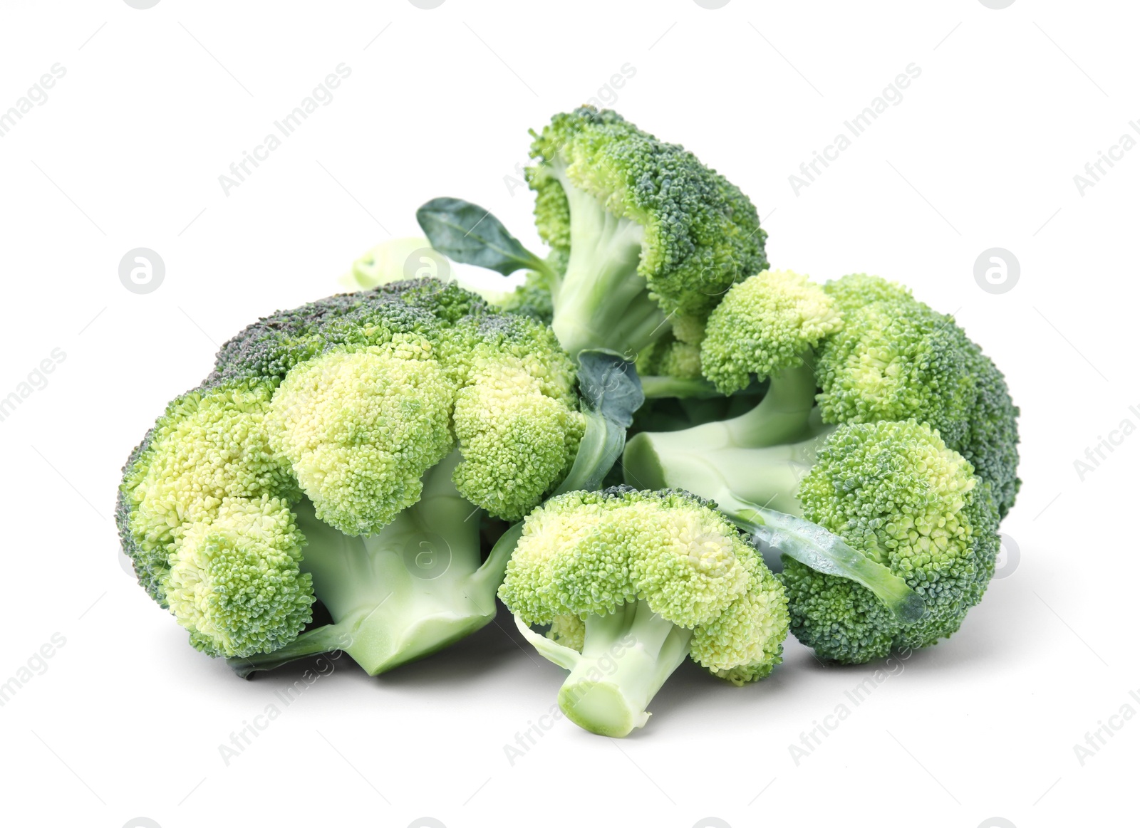 Photo of Pile of fresh raw green broccoli isolated on white