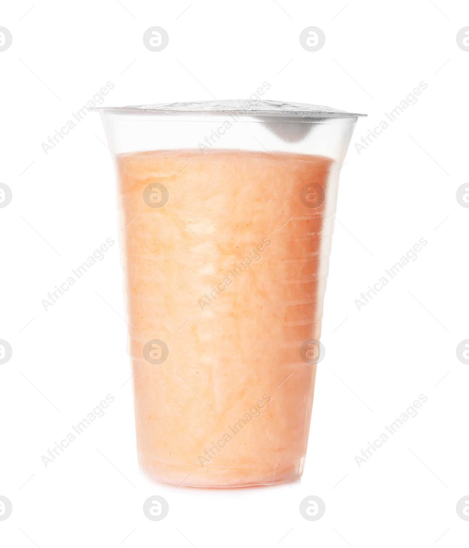 Photo of Yummy cotton candy in plastic cup on white background