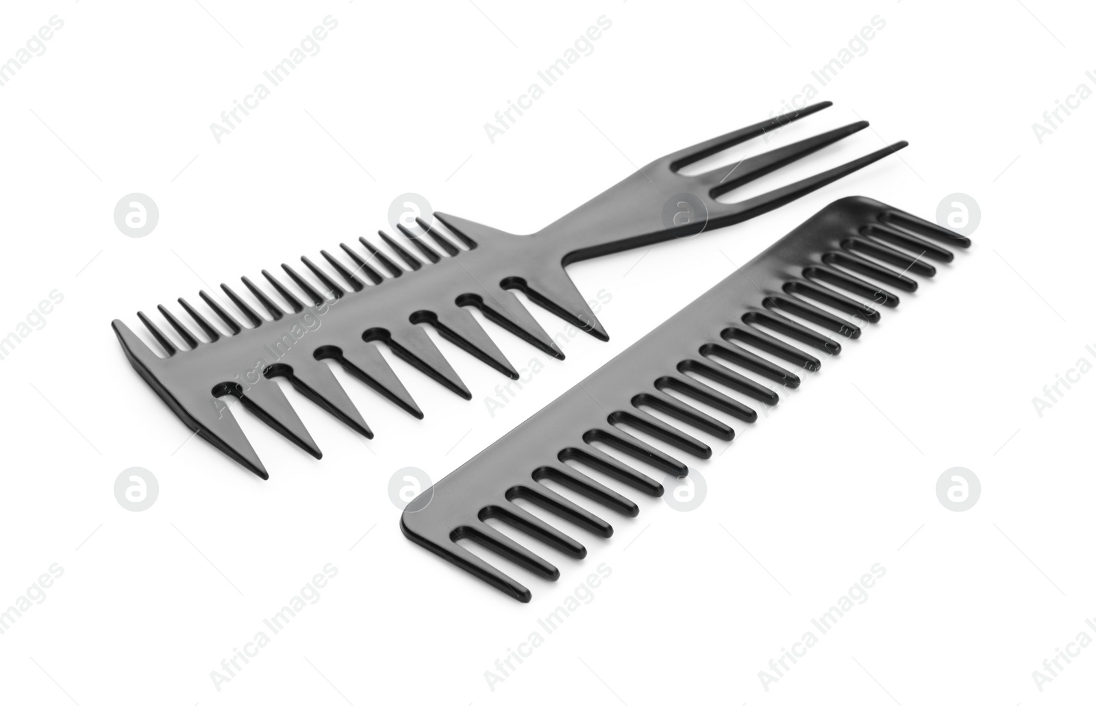 Photo of Two new hair combs isolated on white