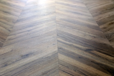 Modern wooden floor as background, closeup view