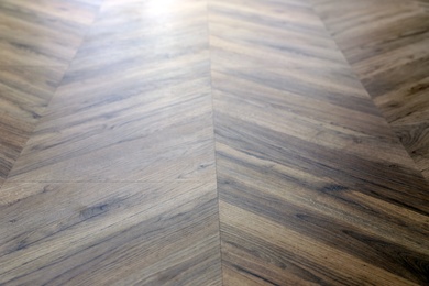 Photo of Modern wooden floor as background, closeup view