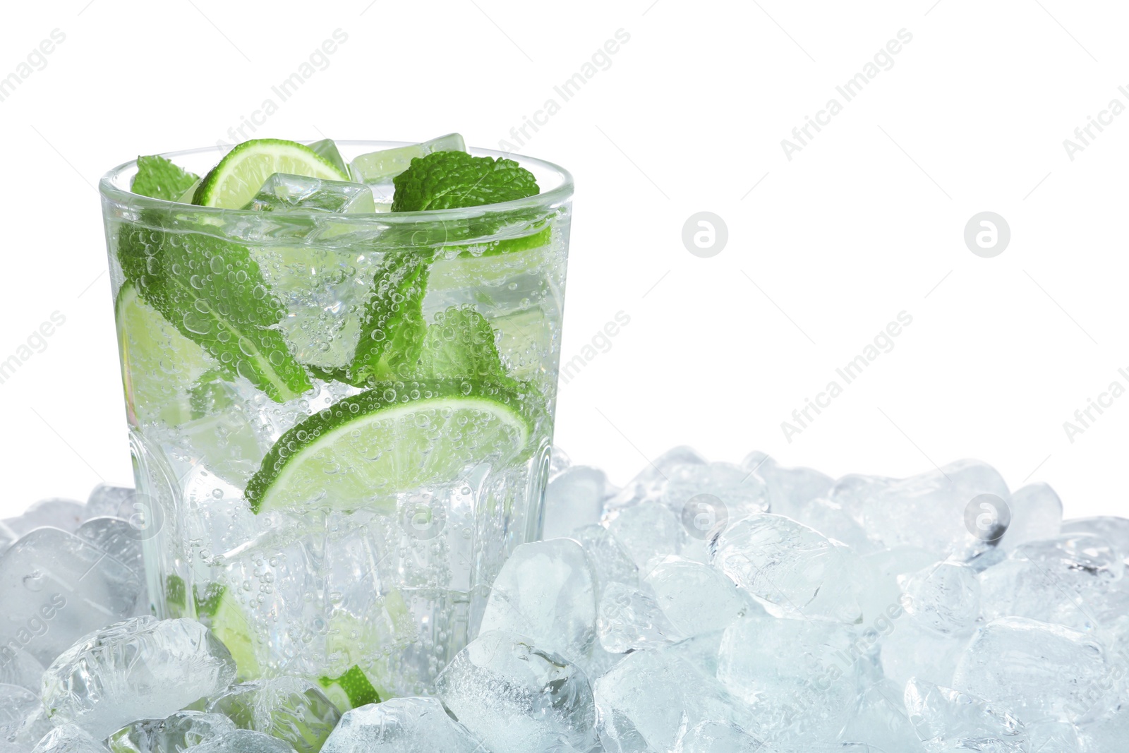 Photo of Ice cubes and delicious cocktail on white background