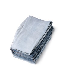 Image of Stack of different folded jeans isolated on white