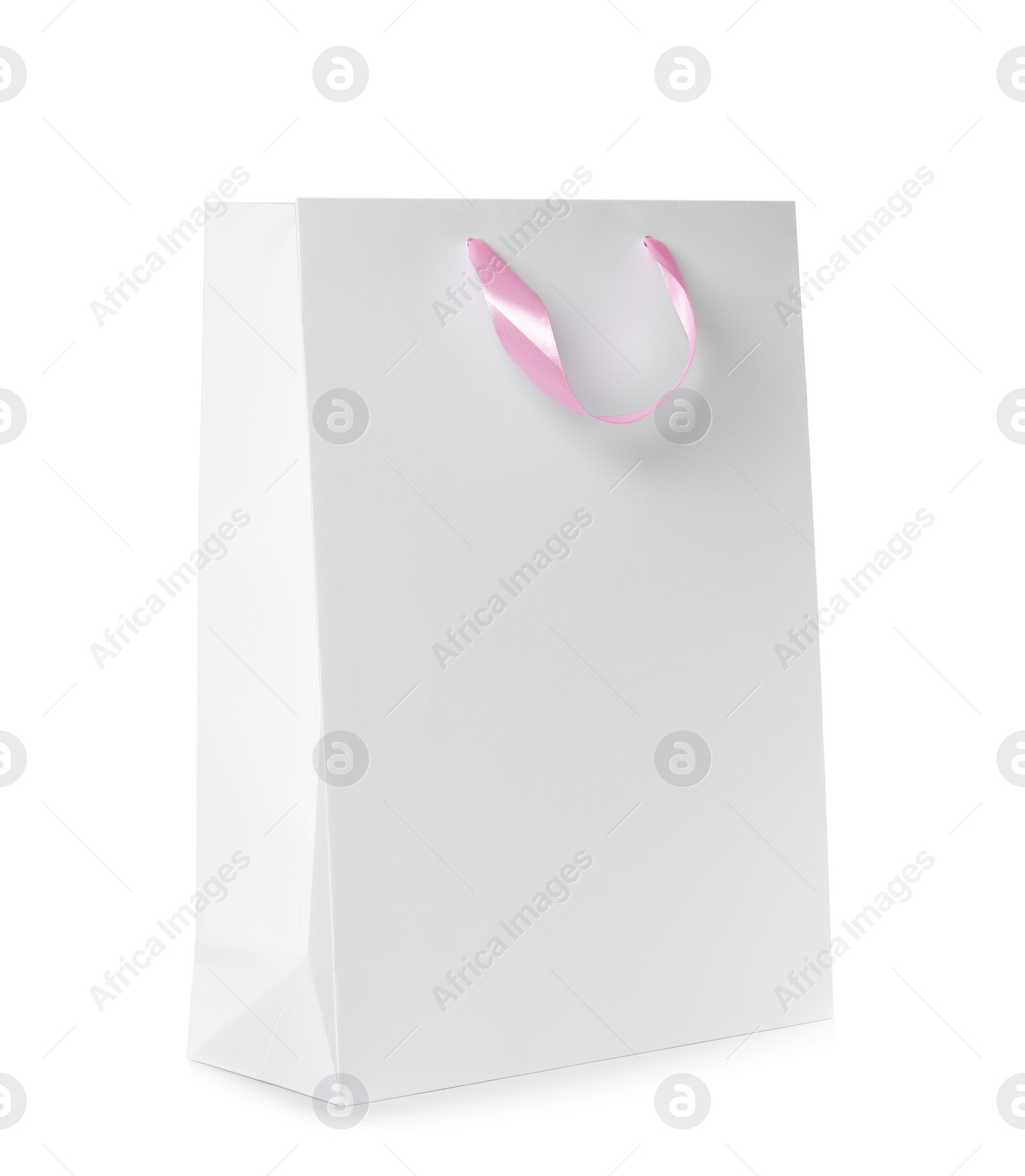 Photo of Paper shopping bag isolated on white. Mock up for design