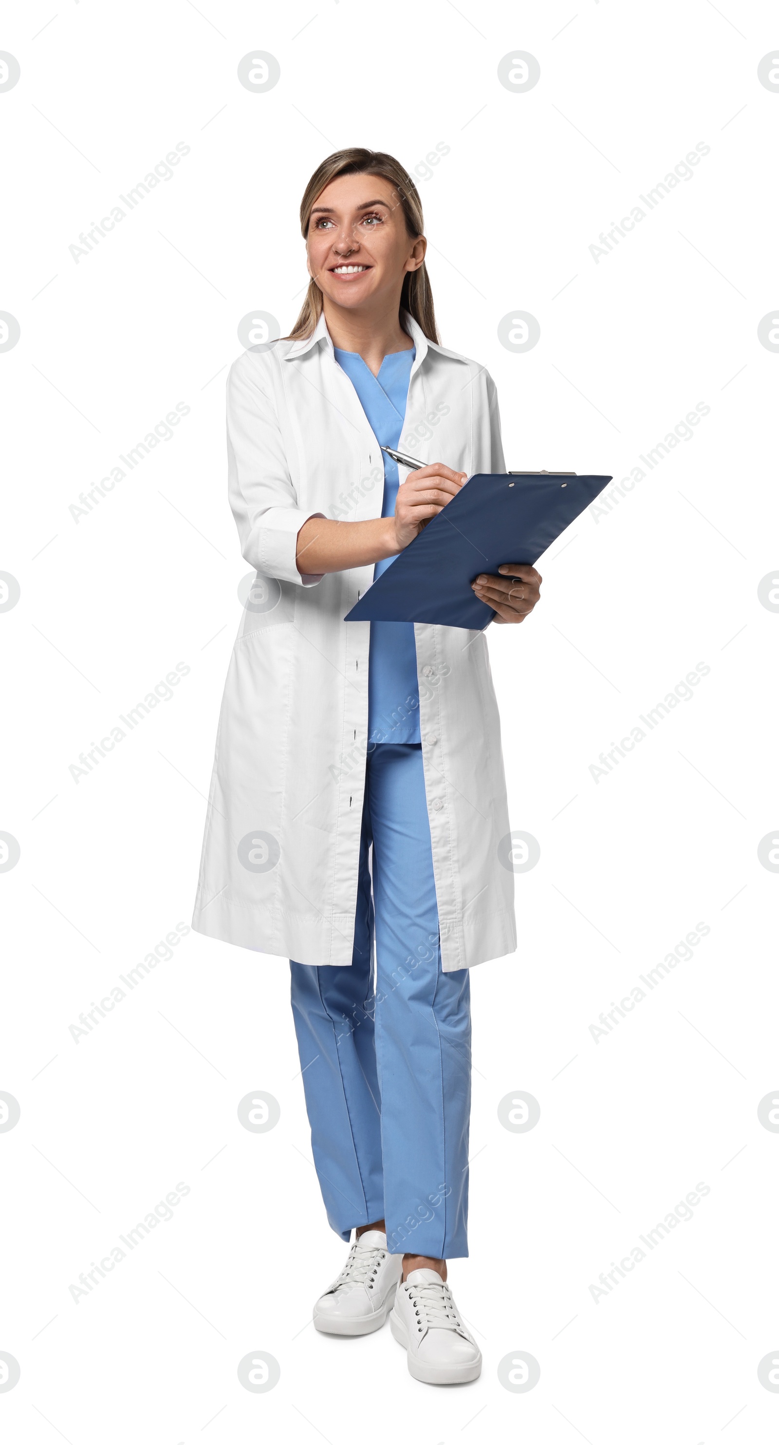 Photo of Portrait of happy doctor with clipboard on white background