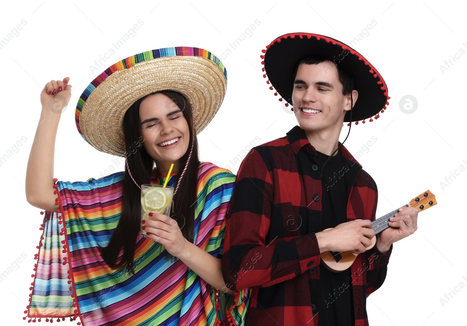 Photo of Lovely couple in Mexican sombrero hats with cocktail and ukulele on white background