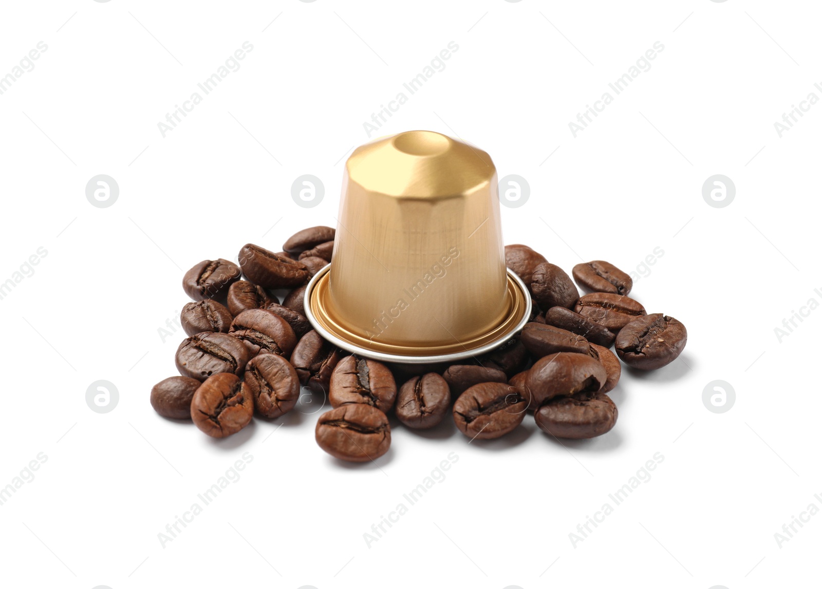 Photo of Coffee capsule and beans isolated on white