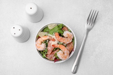 Delicious salad with pomelo, shrimps and tomatoes on white table, flat lay