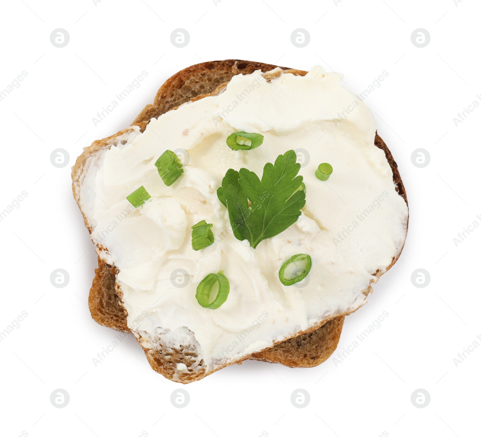 Photo of Bread with cream cheese, green onion and parsley on white background, top view