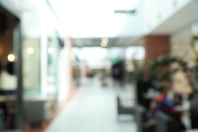 Photo of Blurred view of shopping mall interior. Bokeh effect