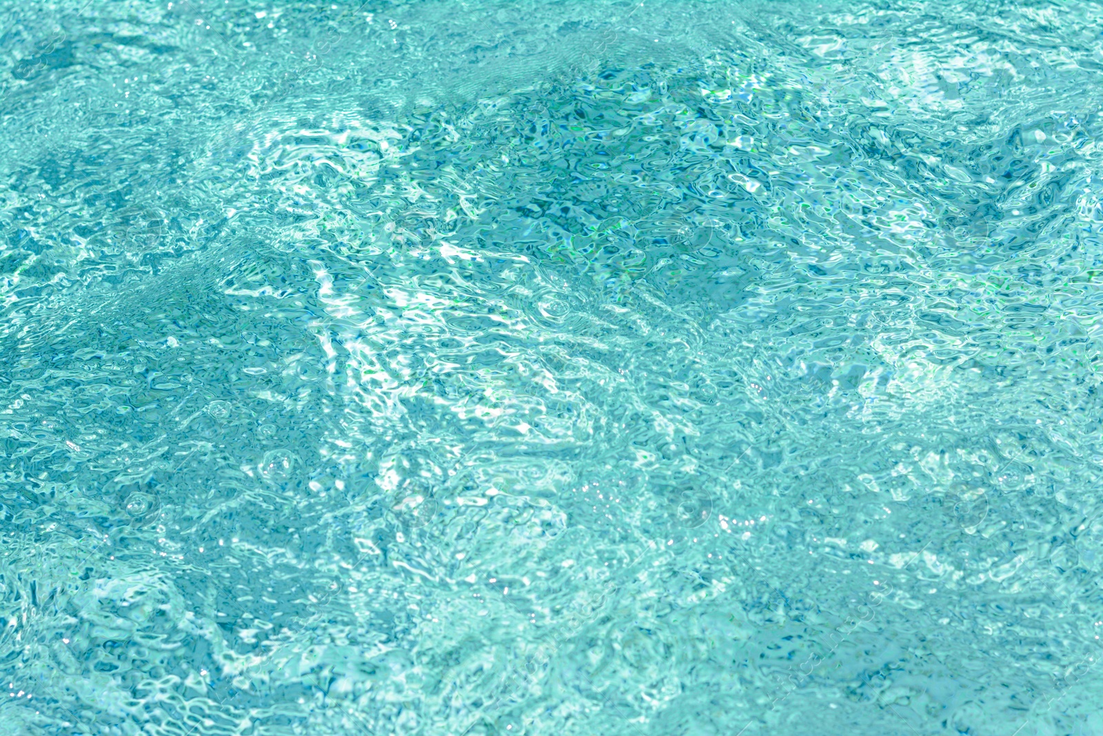 Photo of Rippled water in swimming pool as background