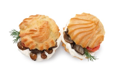 Delicious profiteroles with cream cheese, mushrooms, tomato and dill on white background, top view