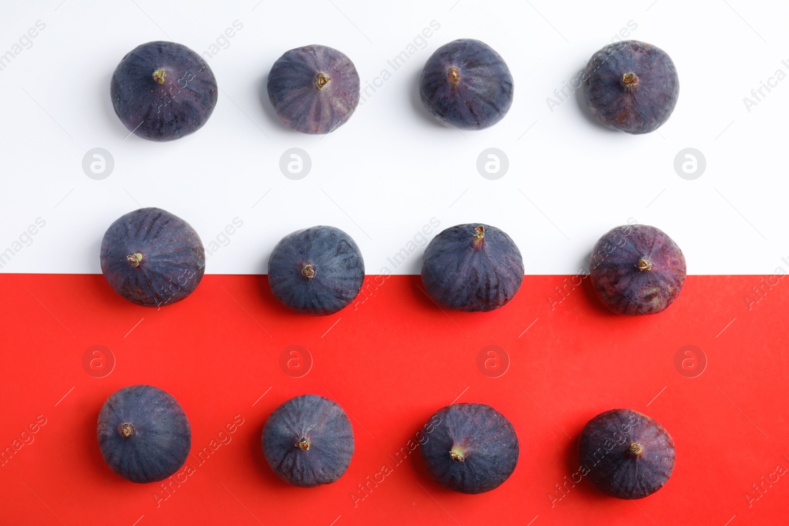 Photo of Delicious ripe figs on color background, flat lay