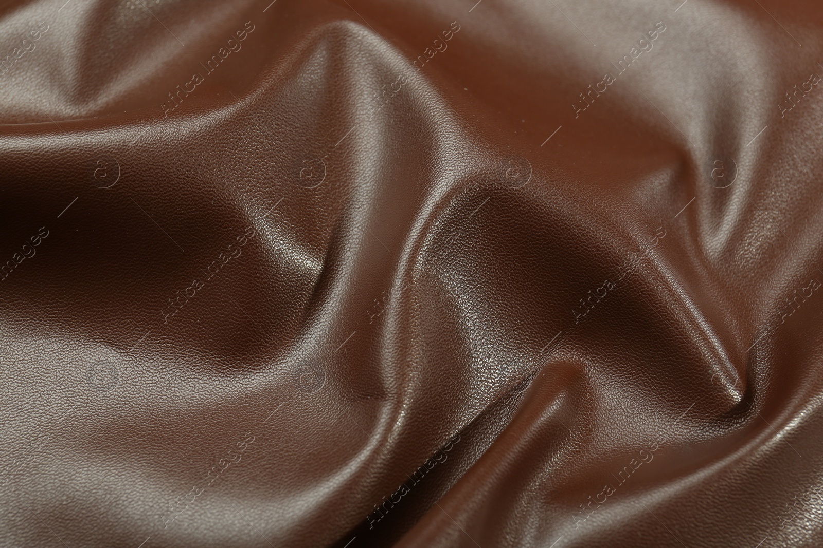 Photo of Brown natural leather as background, above view