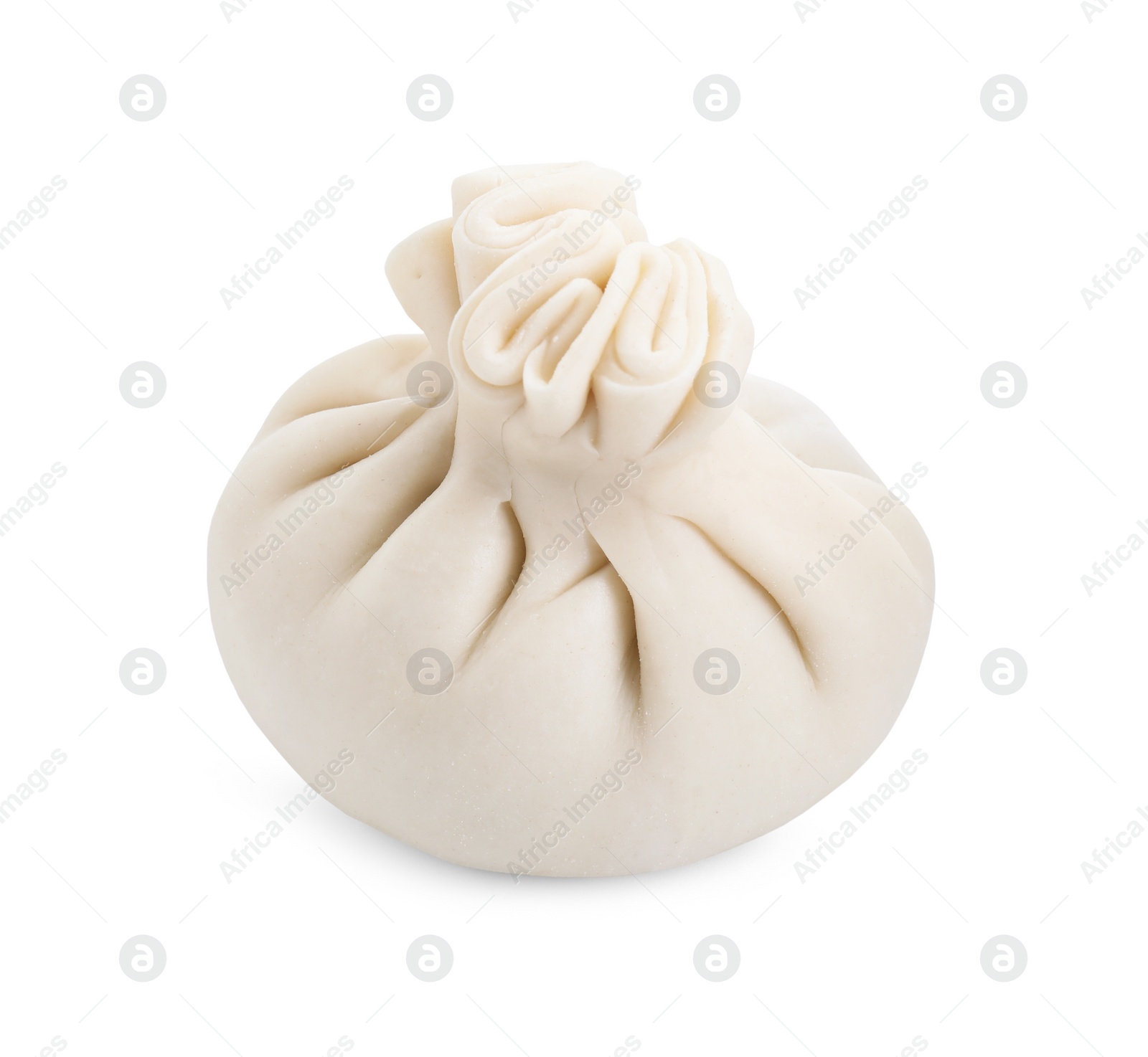 Photo of Uncooked khinkali (dumpling) isolated on white. Georgian cuisine