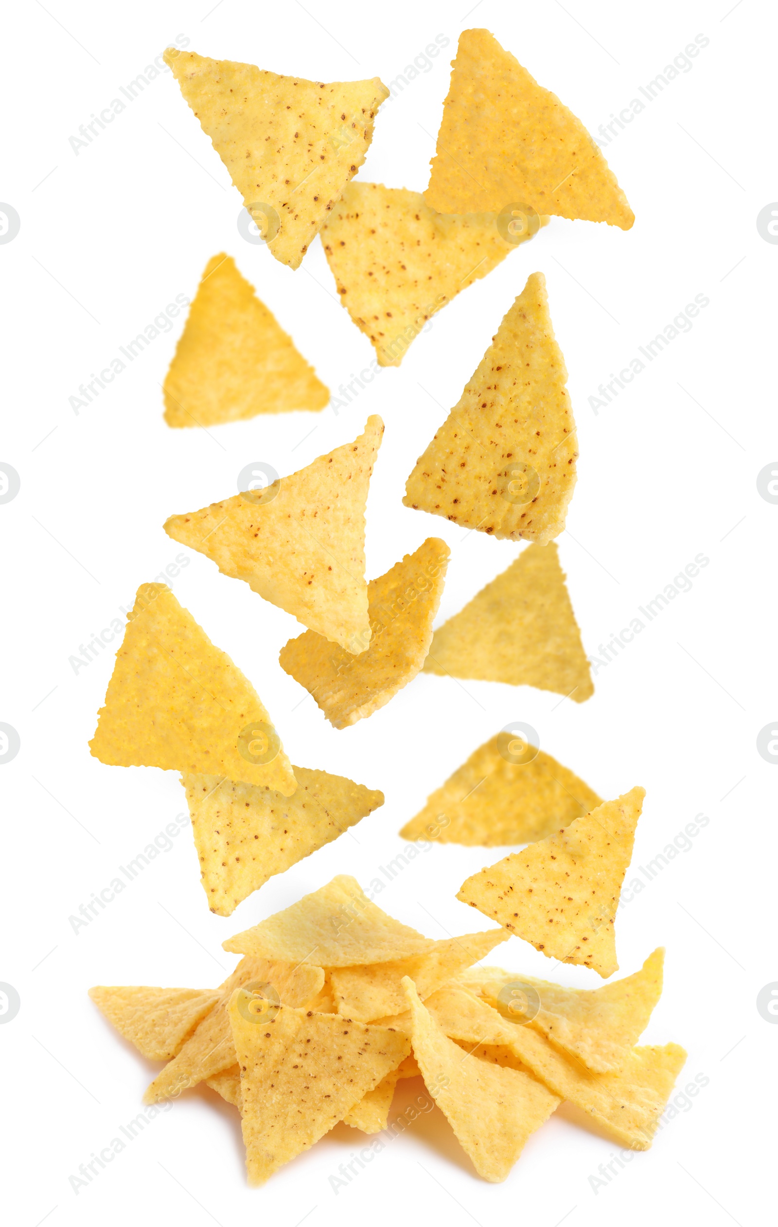 Image of Tasty tortilla chips (nachos) falling into pile on white background