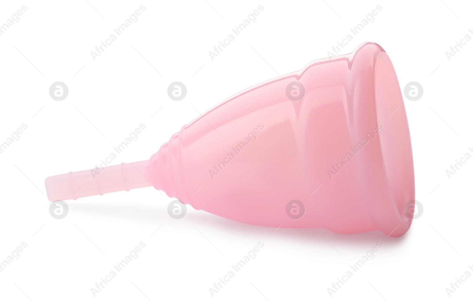 Photo of One pink menstrual cup isolated on white