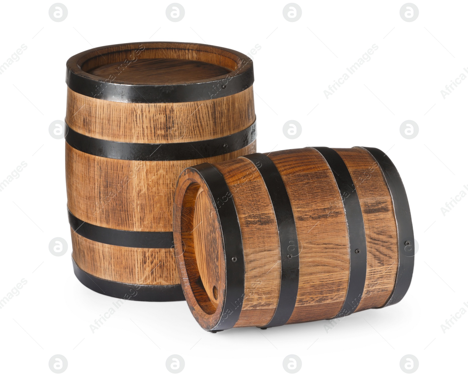 Photo of Two traditional wooden barrels isolated on white