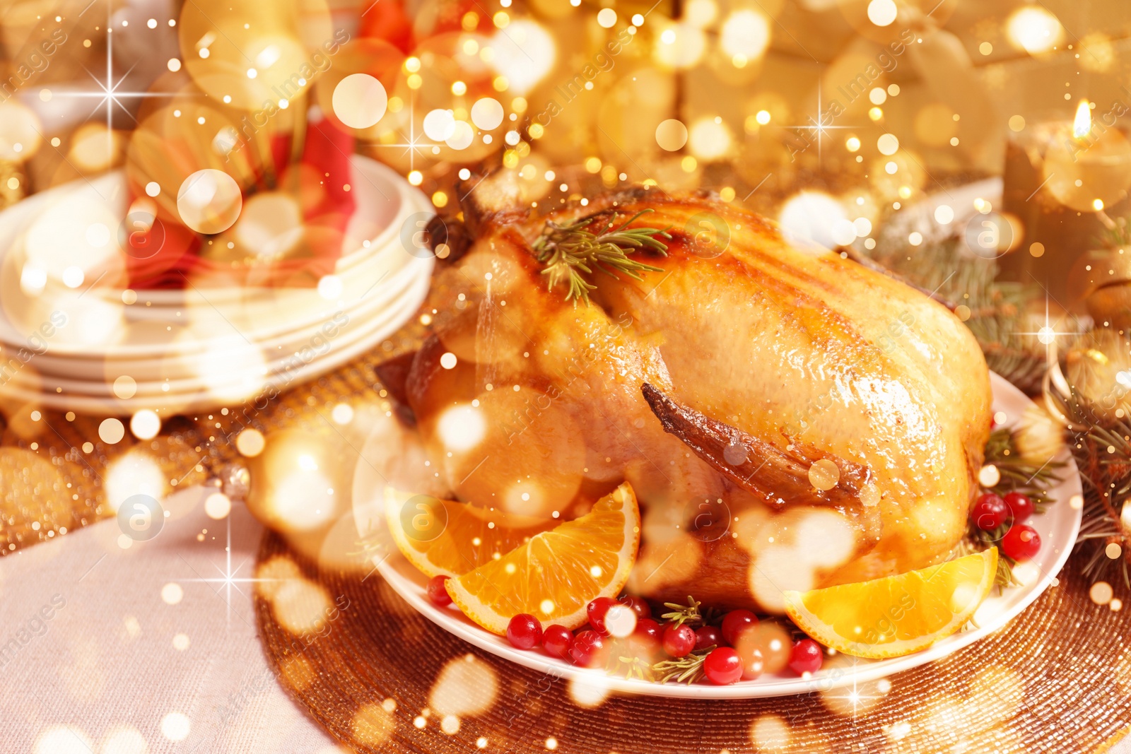 Image of Delicious roasted turkey served for Christmas dinner on table