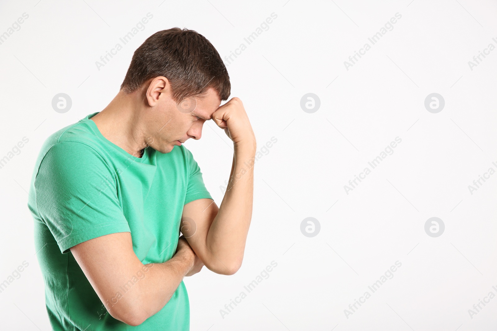 Photo of Emotional man in casual outfit on white background