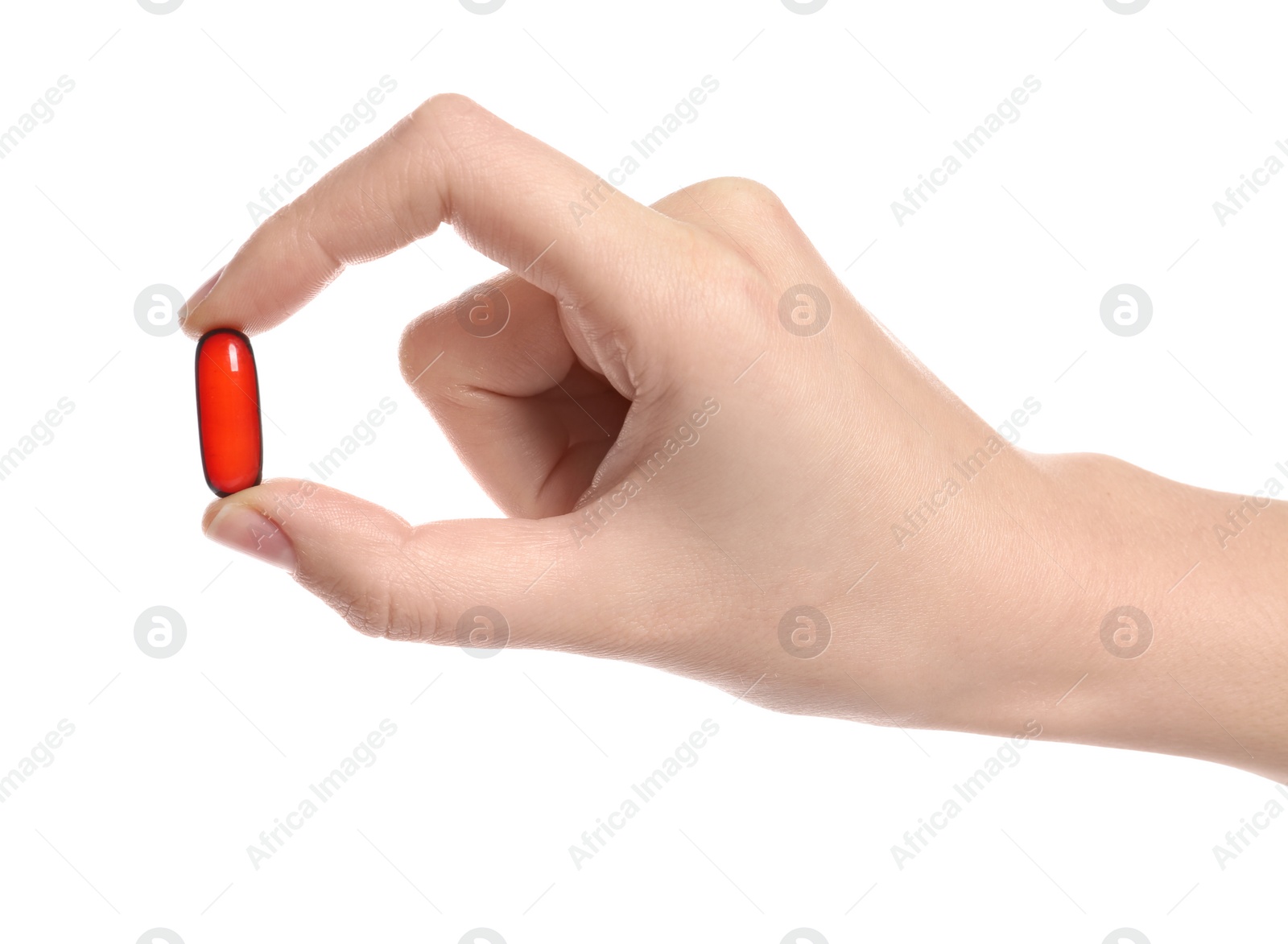 Photo of Woman holding color pill on white background, closeup