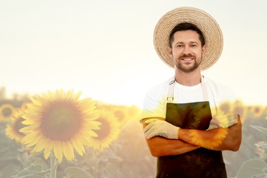 Image of Double exposure of happy farmer and sunflower field. Space for text