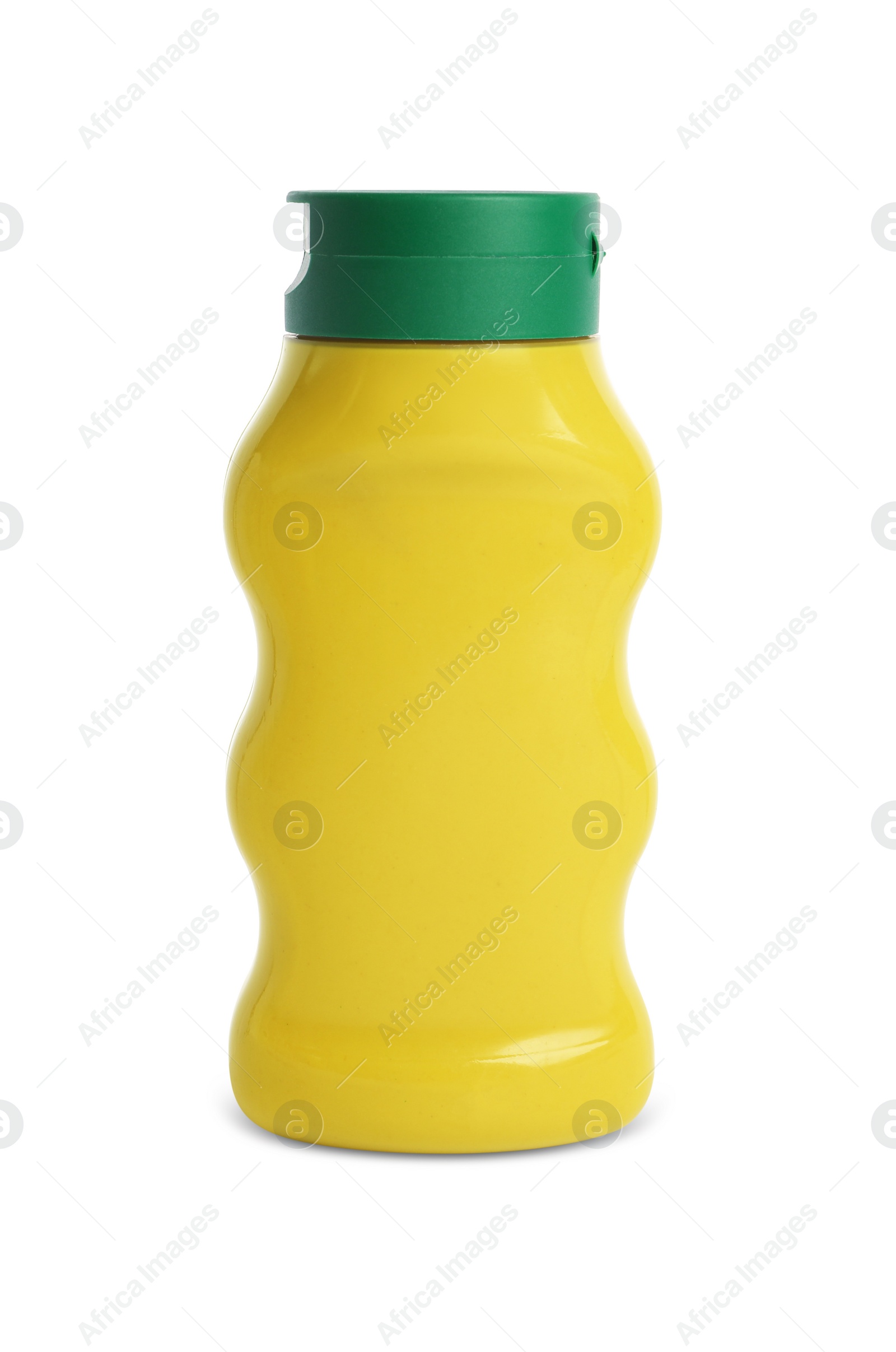 Photo of Spicy mustard in plastic bottle isolated on white