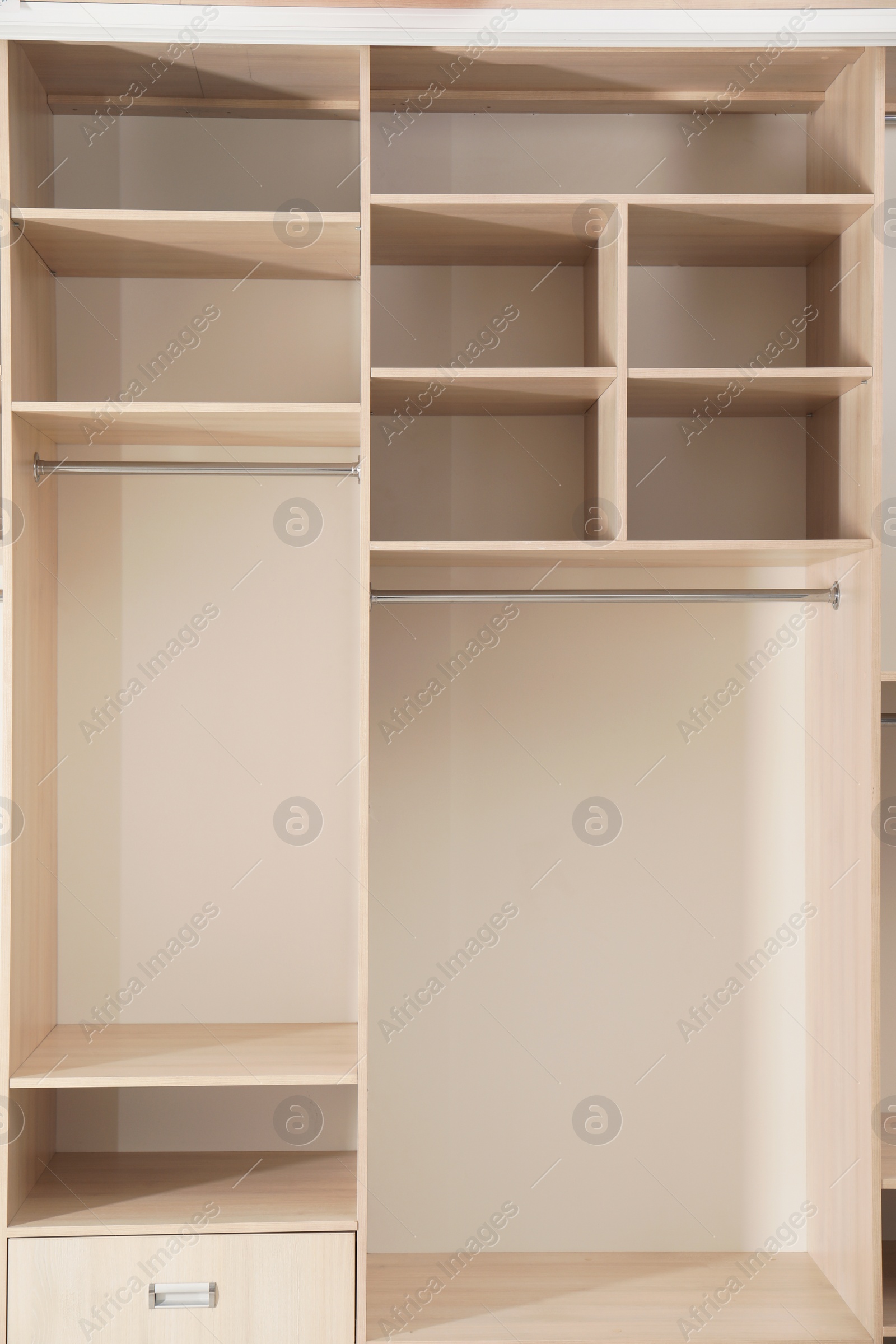 Photo of Empty wooden wardrobe with shelves as background