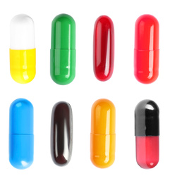 Image of Set with colorful pills on white background, top view