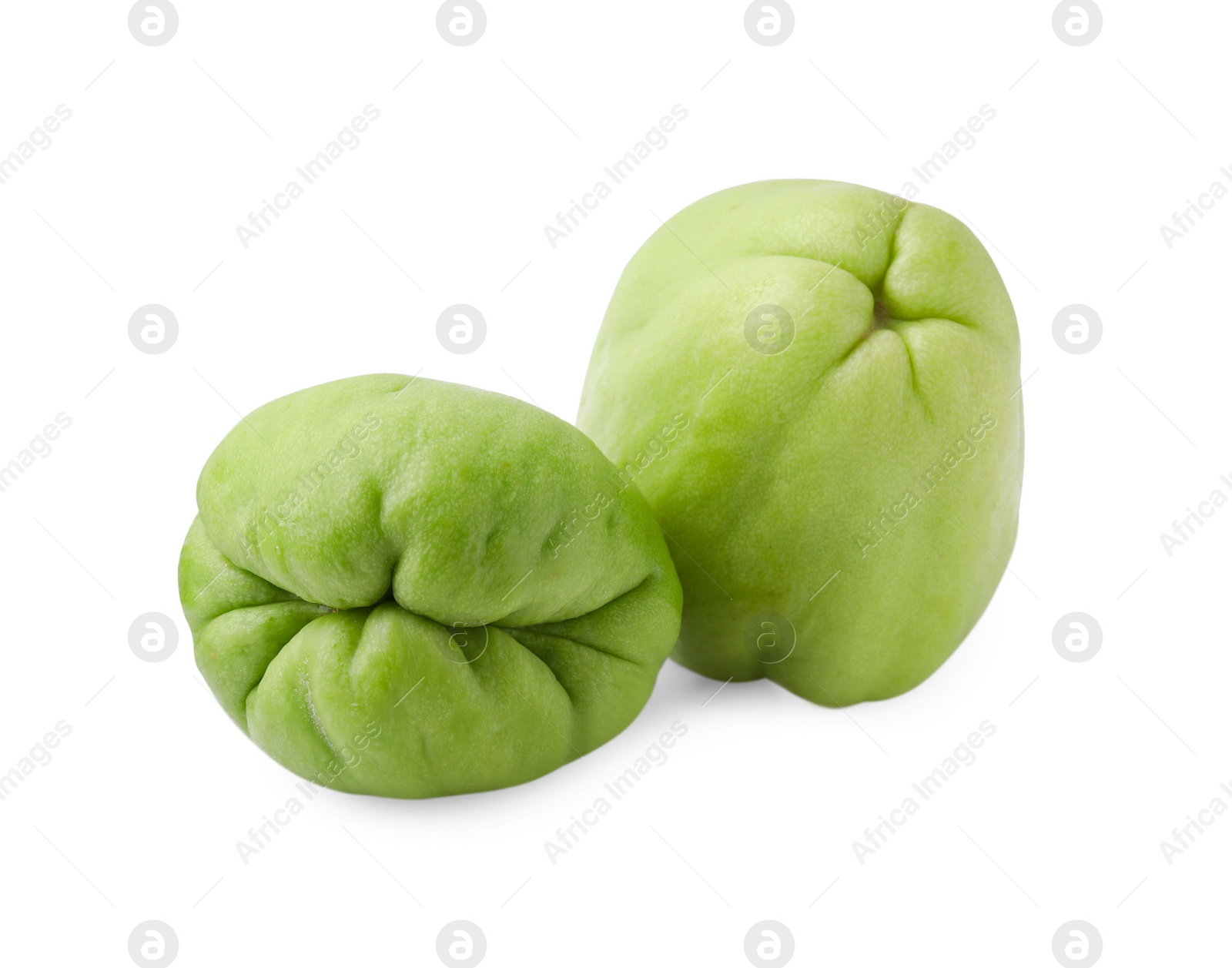 Photo of Two fresh green chayote isolated on white