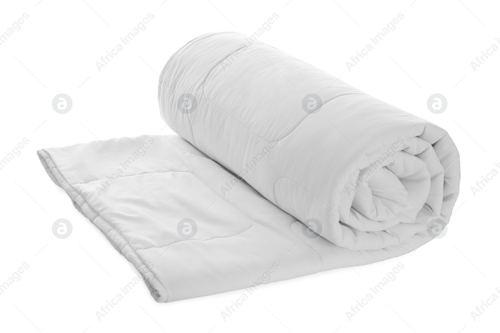 Photo of Rolled clean blanket isolated on white. Household textile
