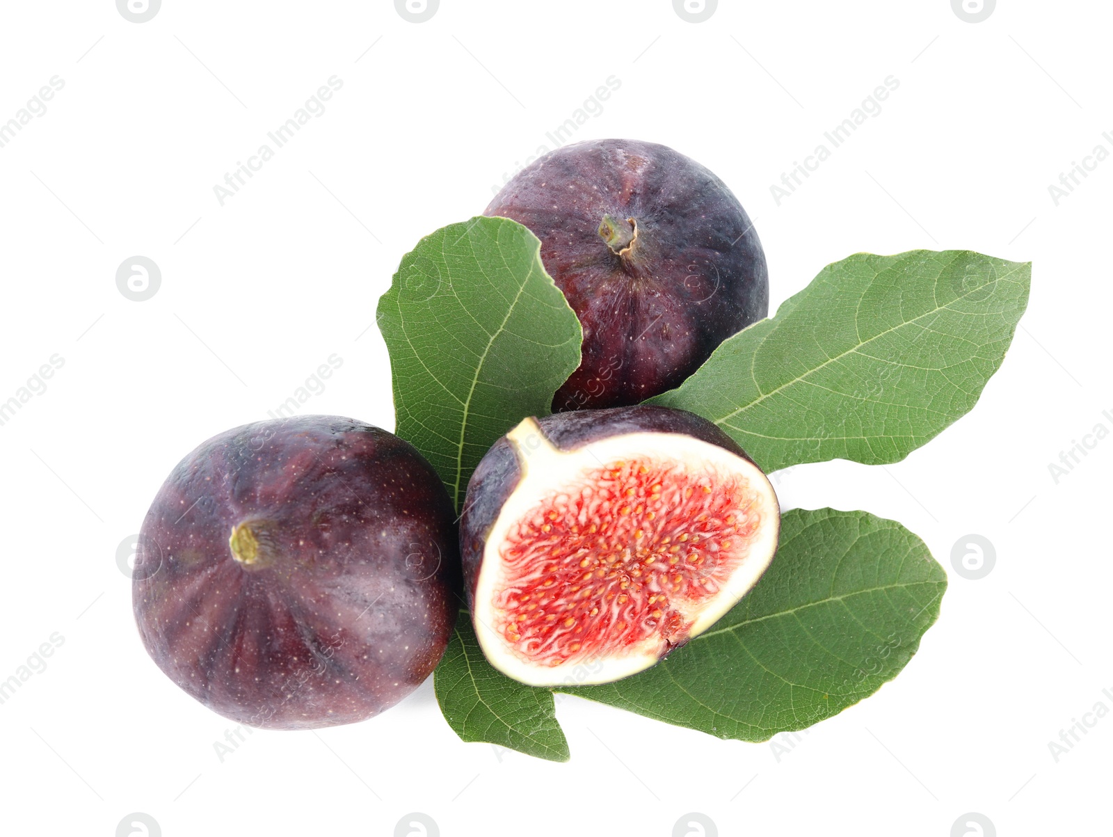 Photo of Fresh juicy purple figs and green leaves on white background, top view