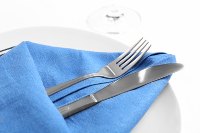 Elegant table setting on white background, closeup