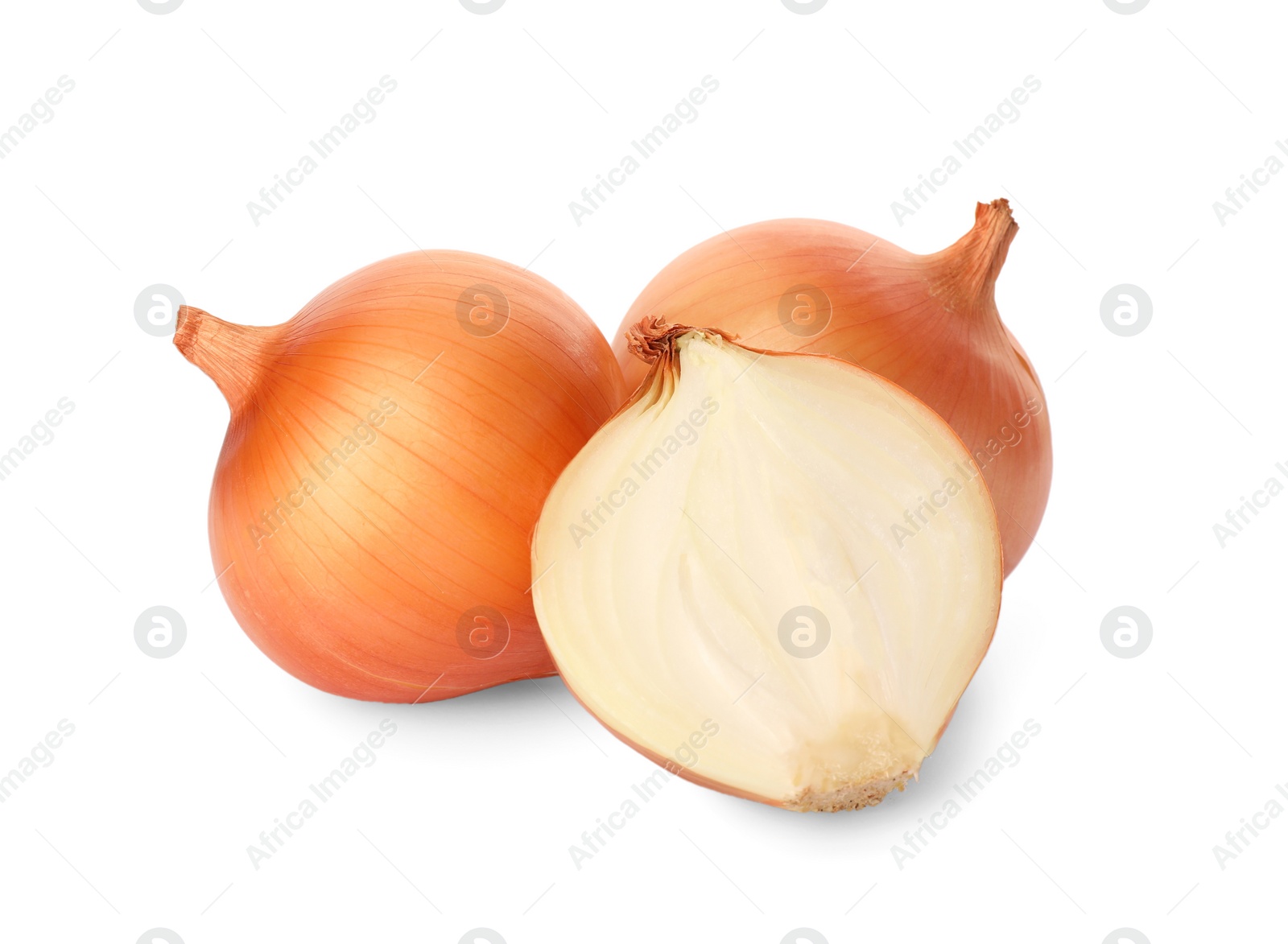 Photo of Whole and cut onions on white background