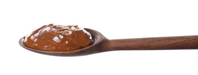 Salted caramel in spoon isolated on white