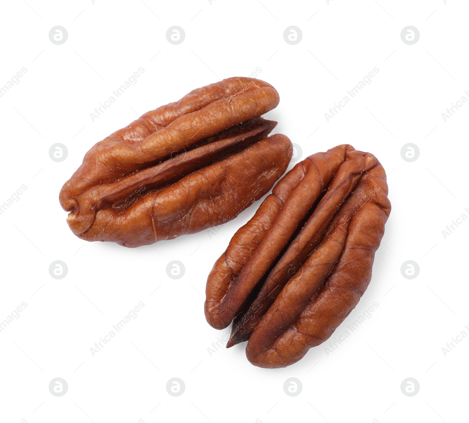 Photo of Tasty pecan nuts isolated on white, top view