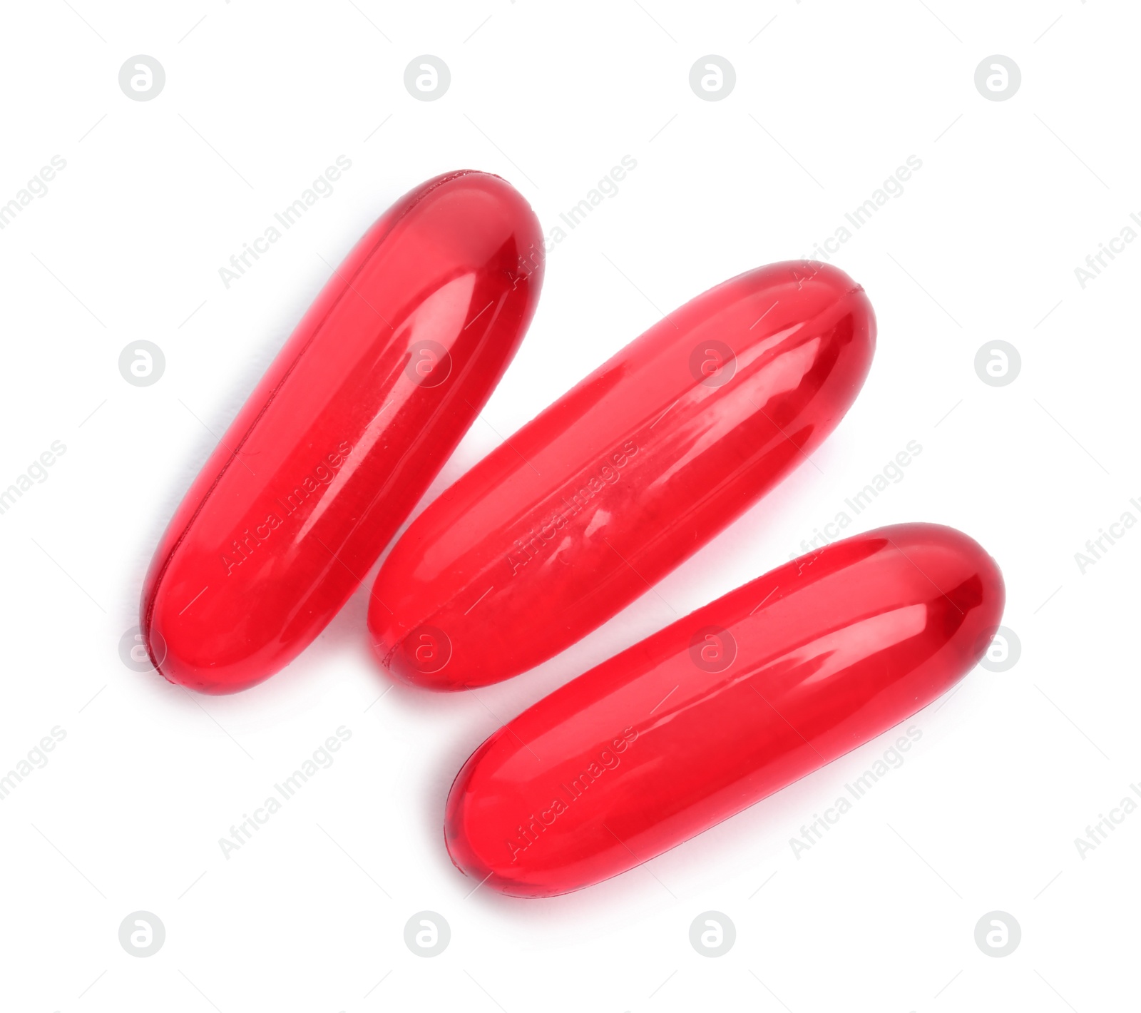 Photo of Color pills on white background, top view. Medical treatment