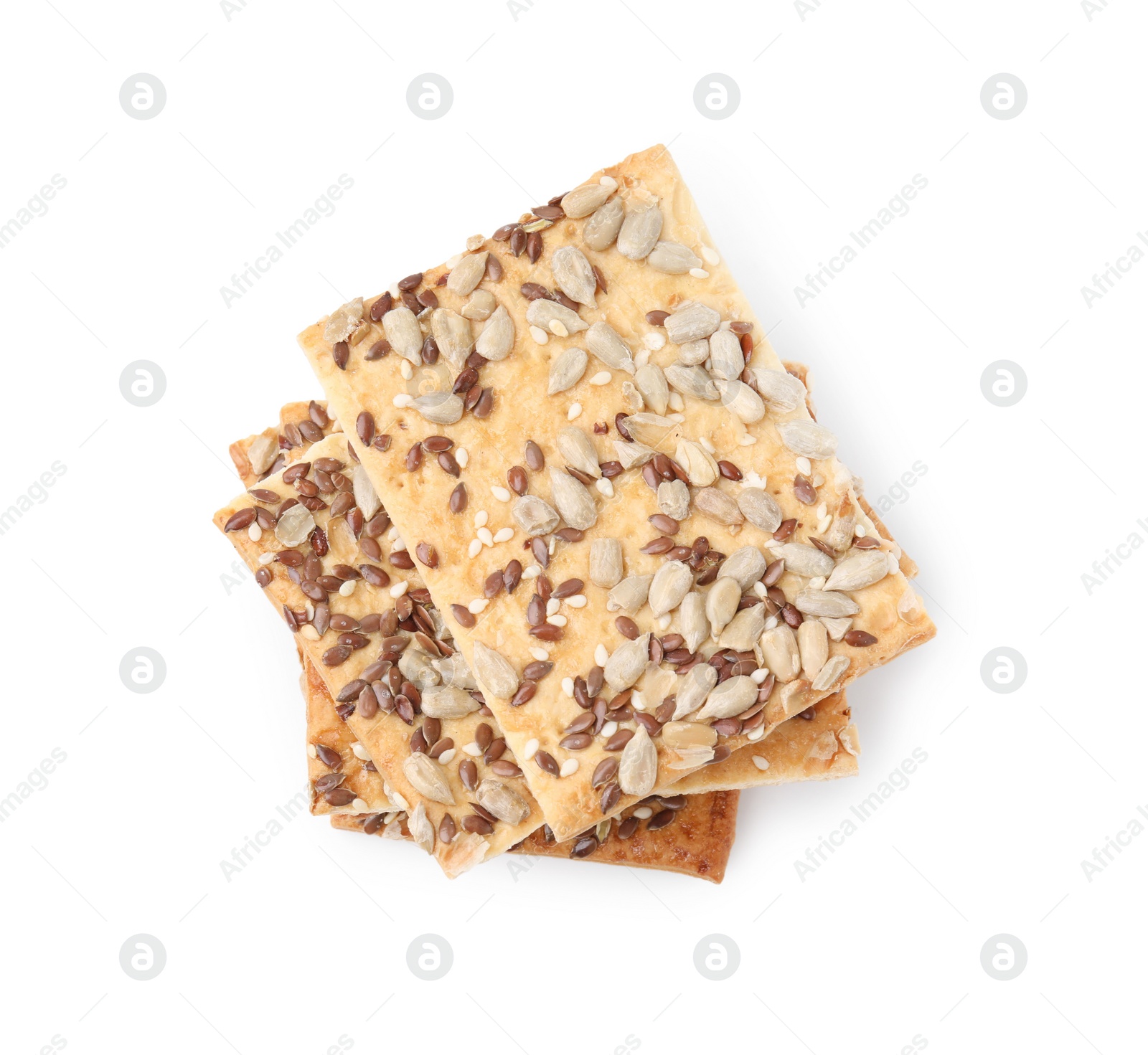 Photo of Stack of cereal crackers with flax, sunflower and sesame seeds isolated on white, top view