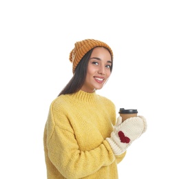 Photo of Happy beautiful woman with paper cup of mulled wine on white background