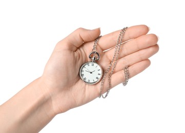 Woman holding pocket clock with chain on white background, closeup