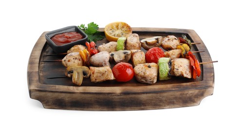 Wooden board with delicious shish kebabs, tomato sauce and grilled vegetables isolated on white