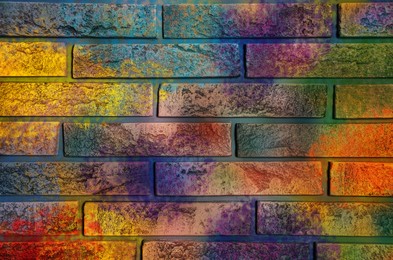 Image of Abstract colorful graffiti drawn on brick wall