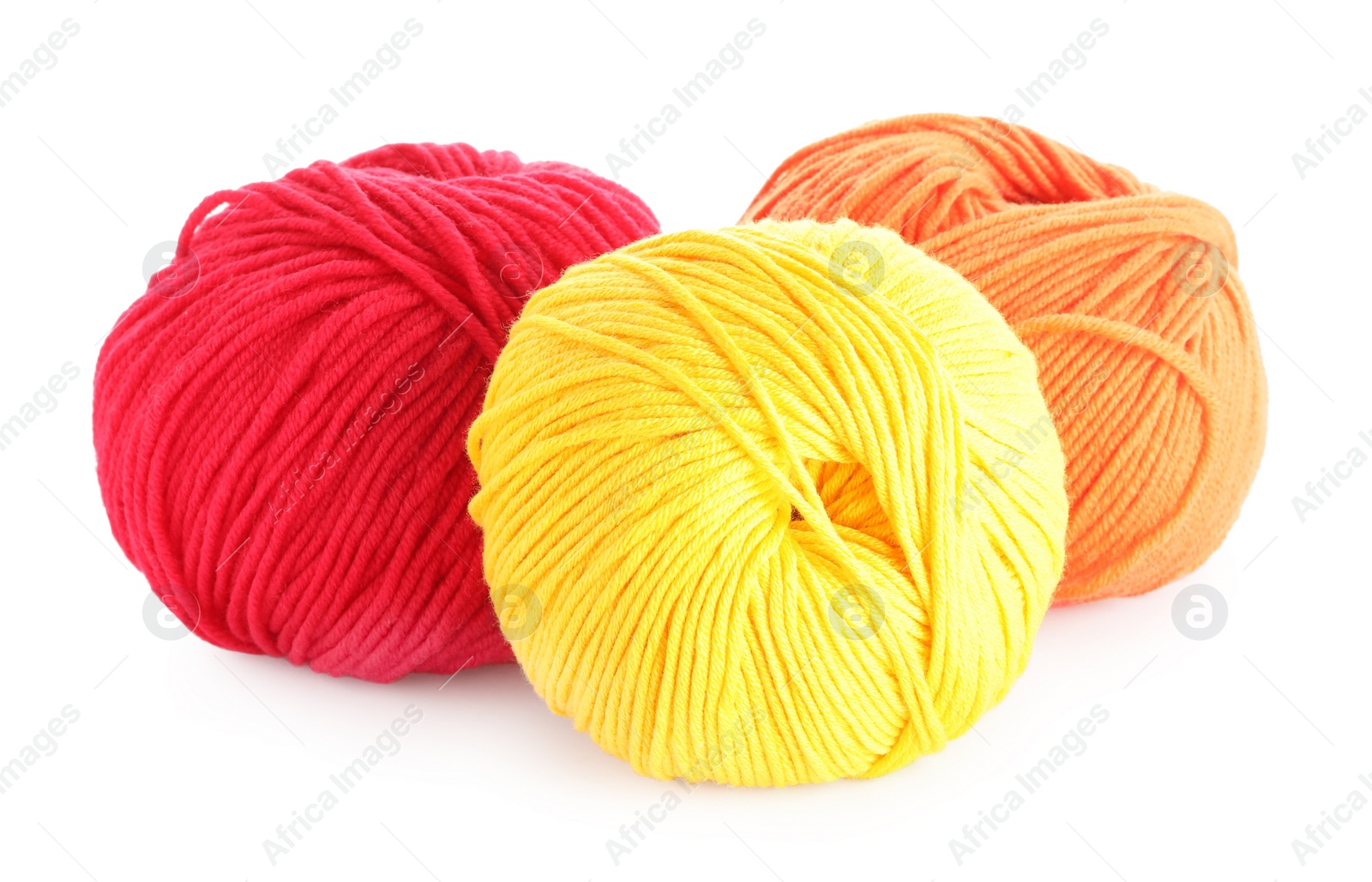 Photo of Different soft colorful woolen yarns on white background