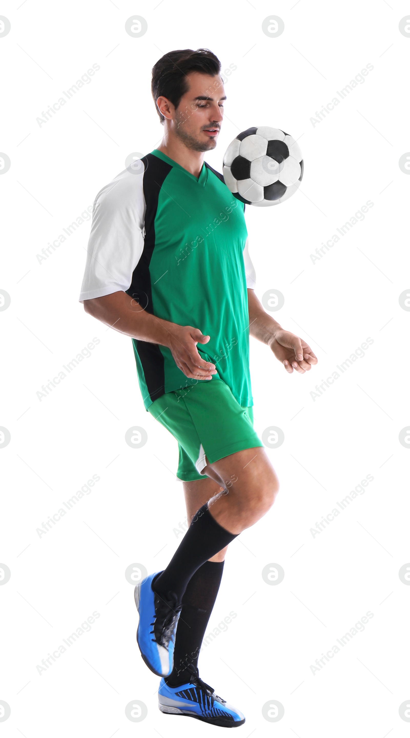 Photo of Young man playing football on white background